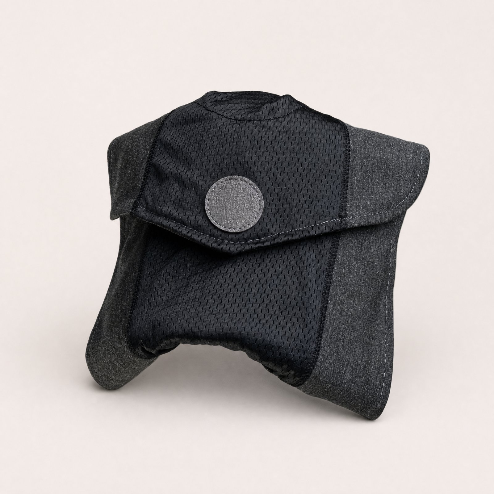 NODD Pillow Cool in black breathable knit, wrapped and closed