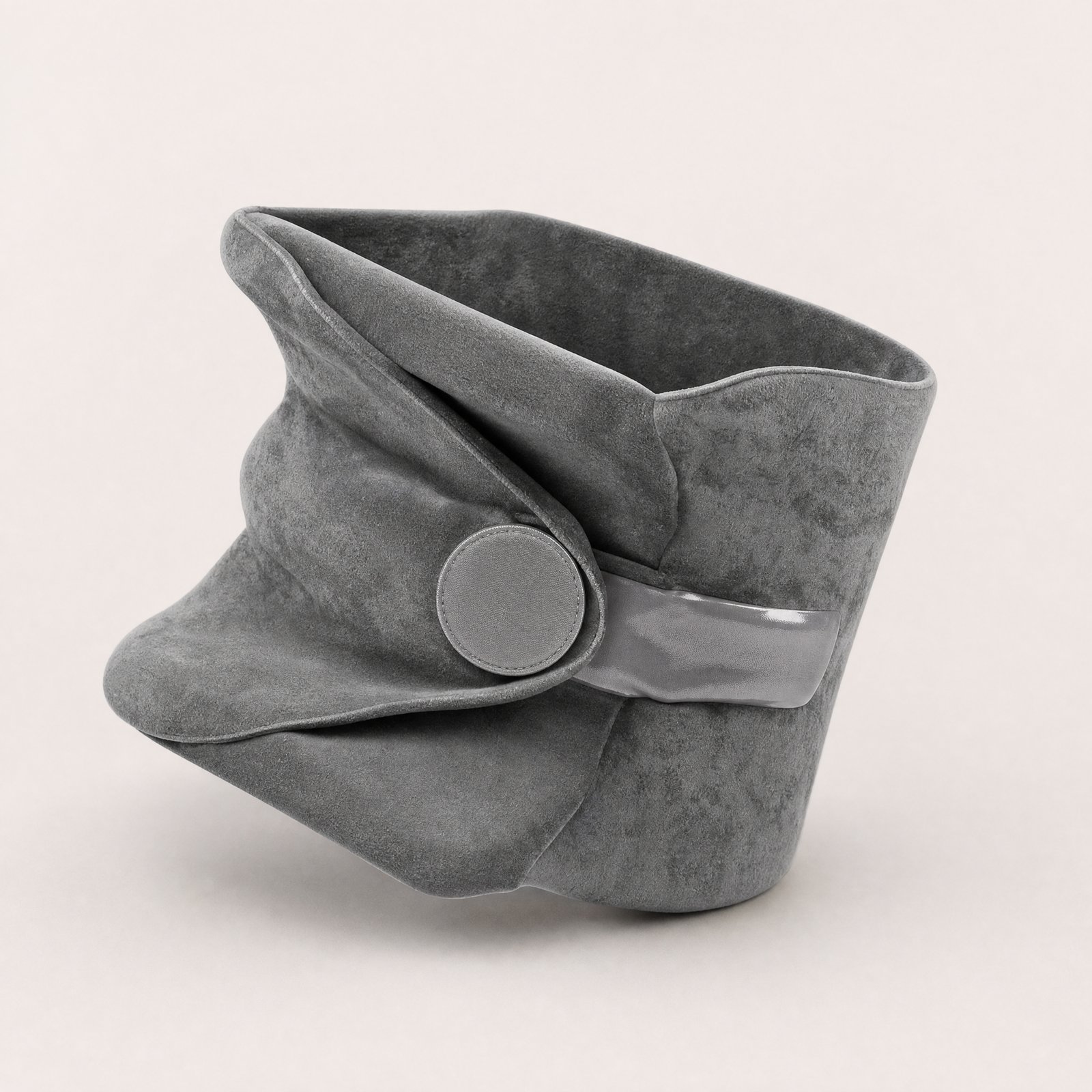 NODD Travel Pillow in grey fleece, wrapped and closed